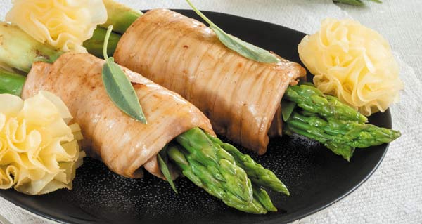 Veal roulades with asparagus, sage butter and Tête de Moine AOP rosettes